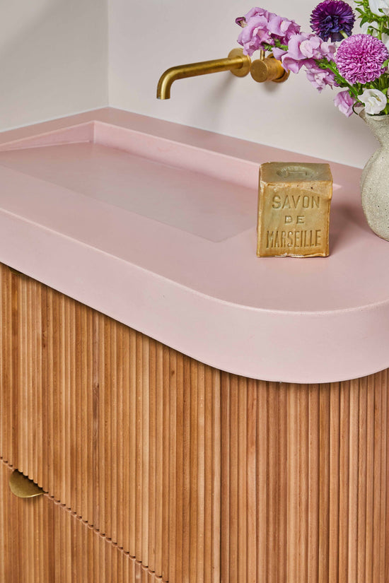 Custom pink curved sink 