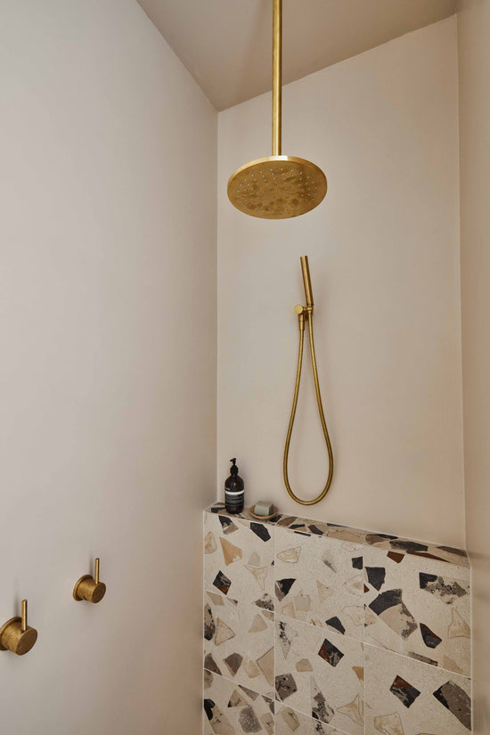 Barwon Heads bathroom with terrazzo tiles and brass shower 